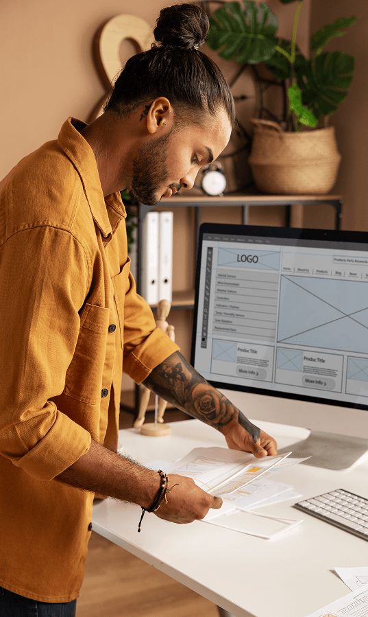 young working man looking a design
